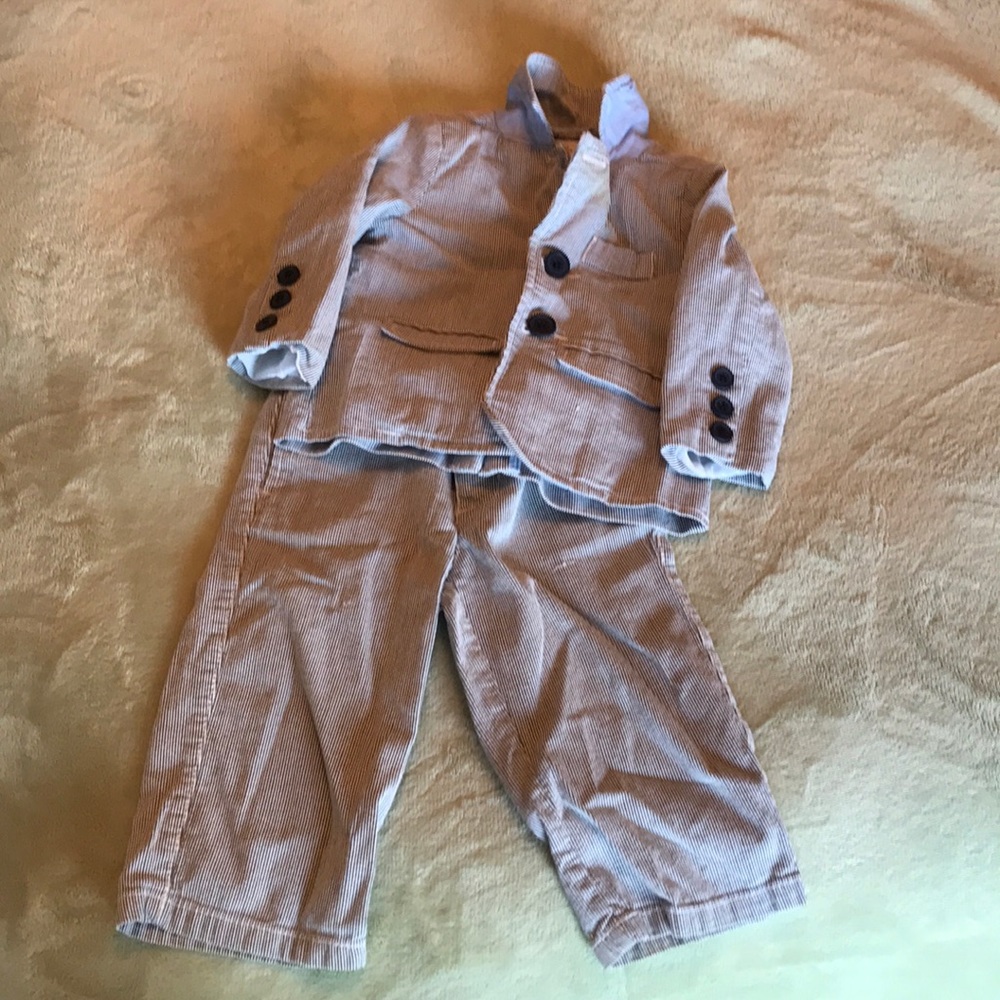 Little man pin striped suit